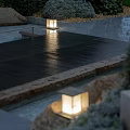 Outdoor Lantern Style Lights Illuminating Wet Stone Pavement In Evening Garden With Natural Surroundings