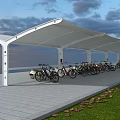 Modern White Canopy Covered Bicycle Parking With Slate Floor And Multiple Bikes