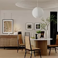 Modern Restaurant Interior Featuring Round Dining Table Rattan Cabinet Green Plant And Wall Art
