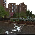 Modern Water Fountain with Butterfly Sculpture Lush Greenery and Seating Near High Rise Residential Buildings