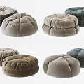 Multiple Soft Fabric Poufs in Various Neutral Tones for Living Room Seating