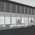 Modern Swing Door Design In Interior Space With Glass Panels And Metal Frames
