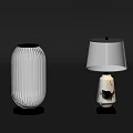 Two Unique Table Lamps With Ribbed White Shade And Black Patterned Base Design