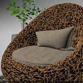 Woven Brown Round Leisure Chair with Light Colored Cushion Green Plant Transparent Vase and Magazines