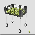 Practical Storage Basket With Wheels Filled With Yellow Balls And A Single Ball Beside
