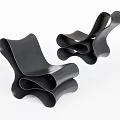 Elegant Modern Black Leisure Chairs Featuring Unique Curved Wave Structure Design 3d model