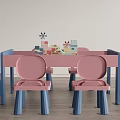 Pink Kids Table with Blue Leg Chairs and Colorful Toy Blocks for Children