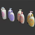 Baby Care Products In Colorful Bottles With Pump Dispensers And Labels