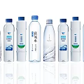 Assorted Mineral Water Bottles With Transparent Design Blue Caps And Labels