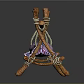 Purple and pink fish hanging on wooden structure made with sticks and ropes