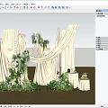 Elegant Floral Installation Featuring Beige Drapes White Flowers And Lush Greenery