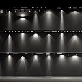 Downlights and Spotlights Installed on Track Showing Bright Uniform Light Projection in Space