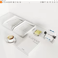 Stylish White Books and Magazines Display With Coffee Cup Sticky Notes And Business Card Holder