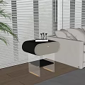 Black and White Nightstand With Transparent Legs Book And Decorative Item Near Sofa