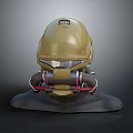 Golden Military Style Helmet Sculpture With Transparent Visor And Side Breathing Apparatus On Black Display Base