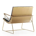 Modern Black Leather Armchair With Gold Metal Frame And Sleek Design