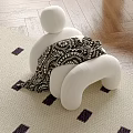 White Sofa Stool With Black And White Patterned Blanket Beige Rug Purple Square Wooden Floor