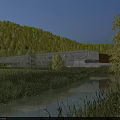 Modern Industrial Factory Building With Glass Walls And Lights Surrounded By Green Hills And River