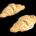 Fresh Baked Croissants Topped With Golden Almond Slices On Black Background