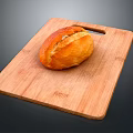 Freshly Baked Golden Bread On Rustic Wooden Cutting Board For Serving