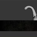 Round Black Stone Sink With Silver Faucet For Kitchen Food Preparation
