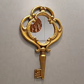 Golden Key Shaped Decorative Mirror With Ornate Frame Hanging On Gray Wall