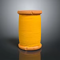 Vintage Wooden Spool with Bright Yellow Thread and Smooth Wooden Top Base