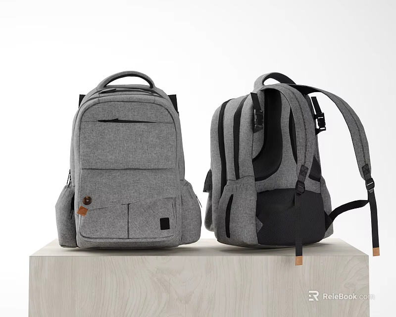 Two Gray And Black Backpacks With Multiple Pockets Adjustable Straps On Wooden Platform 3d model 
