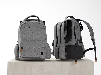 Two Gray And Black Backpacks With Multiple Pockets Adjustable Straps On Wooden Platform 3d model