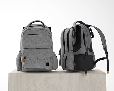Two Gray And Black Backpacks With Multiple Pockets Adjustable Straps On Wooden Platform 3d model