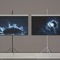 Projection Monitoring Setup With Two Screens On Stands Displaying Vivid Images Indoors