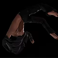 Man In Dynamic Acrobatic Pose Shirtless With Black Pants And Jacket Against Black Background
