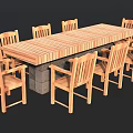Long Rustic Wooden Dining Table With Surrounding Wooden Chairs And Stone Base
