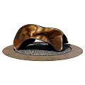 Copper Metal Garden Ornament With Curved Wavy Design On Round Gravel Base