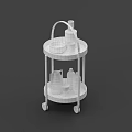 White And Blue Wheeled Two Tier Tea Trolley With Drinks Bottles Glasses In Outdoor Sunlight