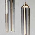 Modern Pendant Lights Featuring Glass Cylinders And Brass Spiral Designs For Interior Decor