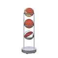 Basketball Gym Interior with Multi Tiered Stand Holding Three Colorful Basketballs