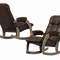 Two Brown Leather Rocking Chairs With Comfortable Padding And Wooden Rocking Legs