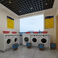 Modern Laundry Room With Red Sinks Washing Machines Yellow Signs And City View