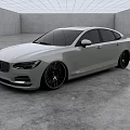 Sleek White Sedan With Black Wheels In Modern Indoor Display Room