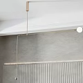 Modern Pendant Light Design With Metal Rod And Round Shades In Minimalist Gray Wall Interior