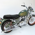 Vintage Dark Green Motorcycle With Black Seat Orange Rims And Chrome Accents