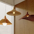 Stylish Woven Pendant Lights In Different Shapes Hanging Above Wooden Wall With Window Blinds
