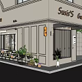 Susi's Garden Two Story Shop With Light Exterior Large Windows Plants And Displayed Goods