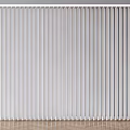 White Vertical Blinds Neatly Arranged in Indoor Space with Wooden Floor