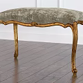 Elegant Velvet Upholstered Bench Featuring Golden Carved Legs On Wooden Floor