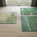 Three Green Square Rugs with Abstract Patterns on Light Wooden Floor in Bright Room