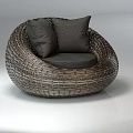 Modern Rattan Armchair With Round Shaped Design And Soft Gray Cushions For Living Room