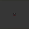 Black And Red Electric Toy Train With Large Wheels Moving On Green Track