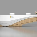 Modern Reception Desk With White Curved Design And Wooden Base Plus Pink Flowers